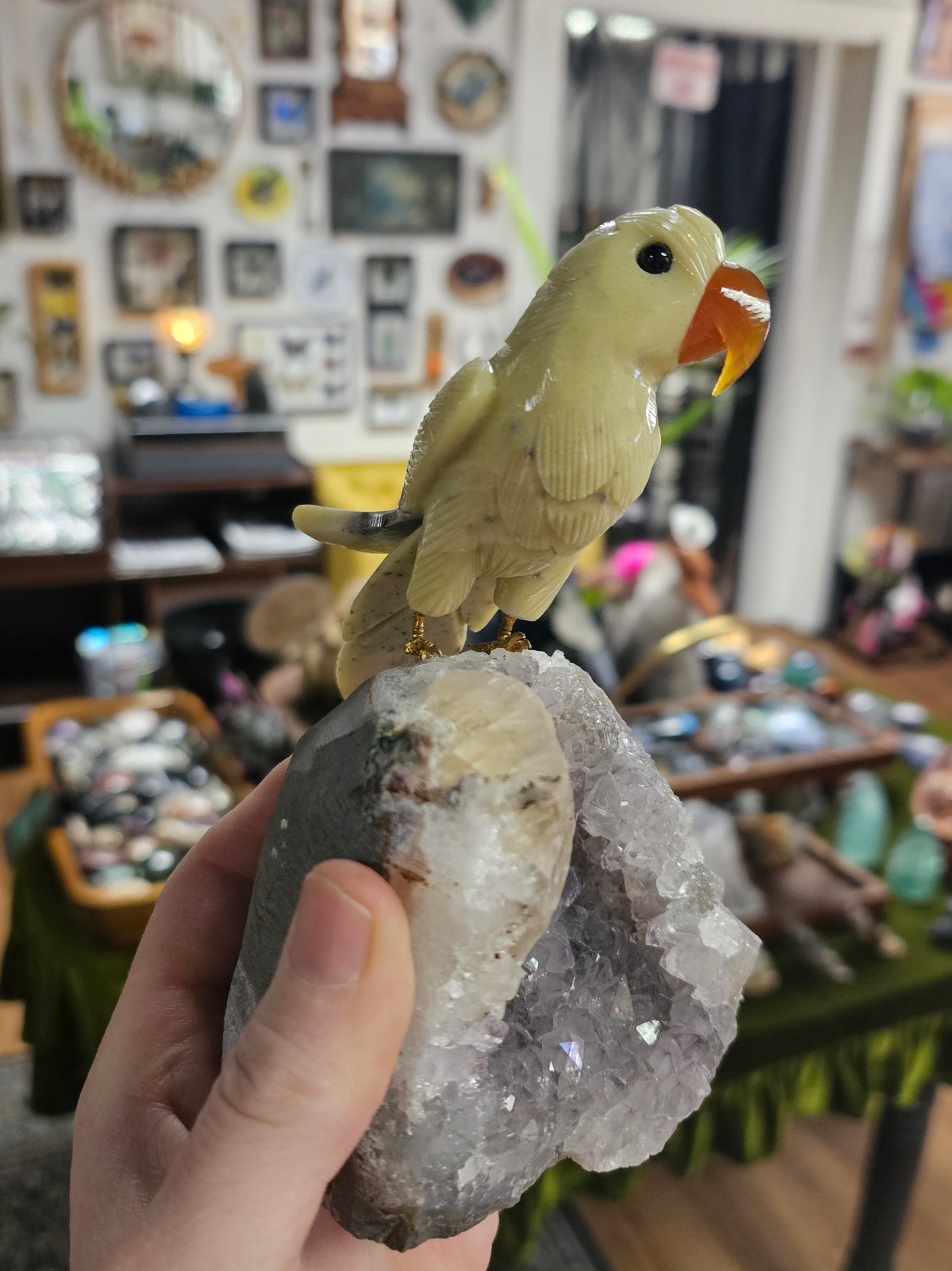 Calcite bird on Amethyst