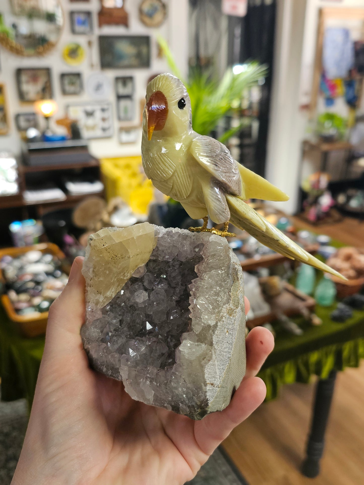 Calcite bird on Amethyst