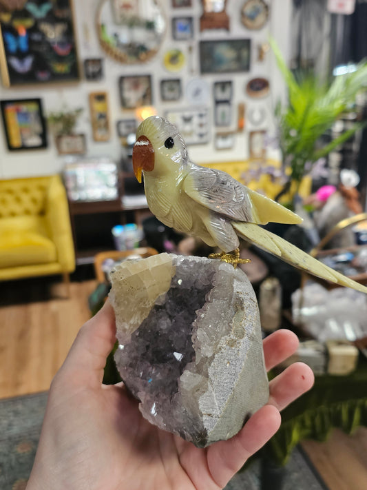 Calcite bird on Amethyst