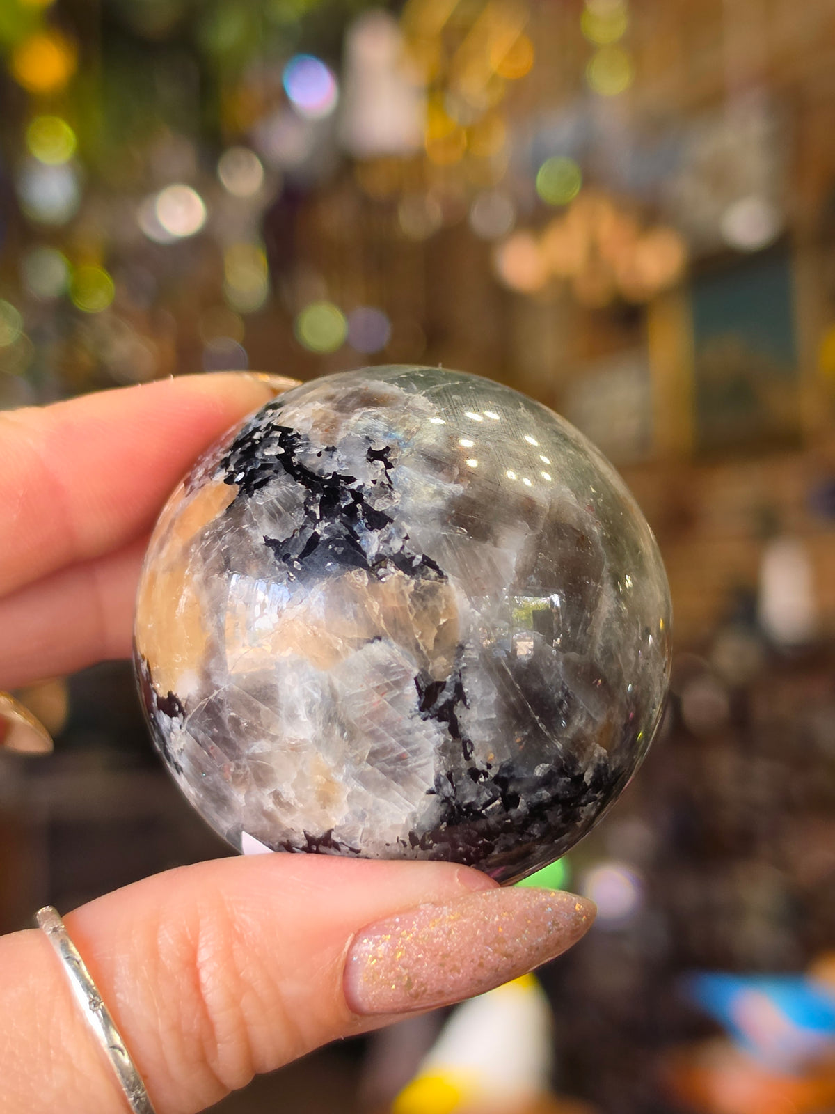 Larvikite and Sunstone sphere