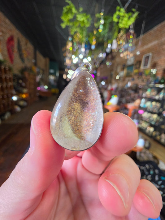 Included Quartz Pendant