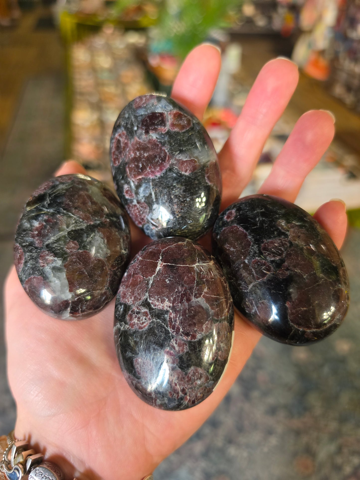 Garnet in Astrophyllite Palmstone