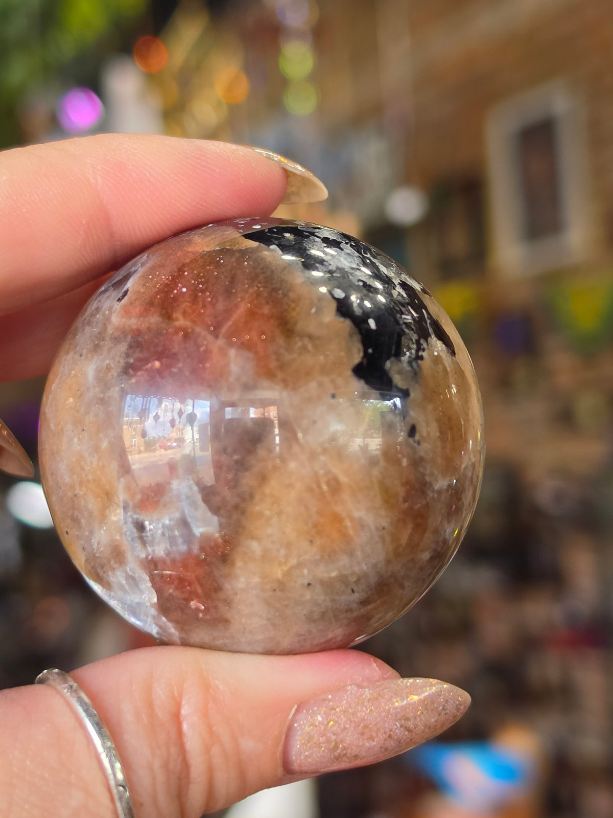 Larvikite and Sunstone Sphere